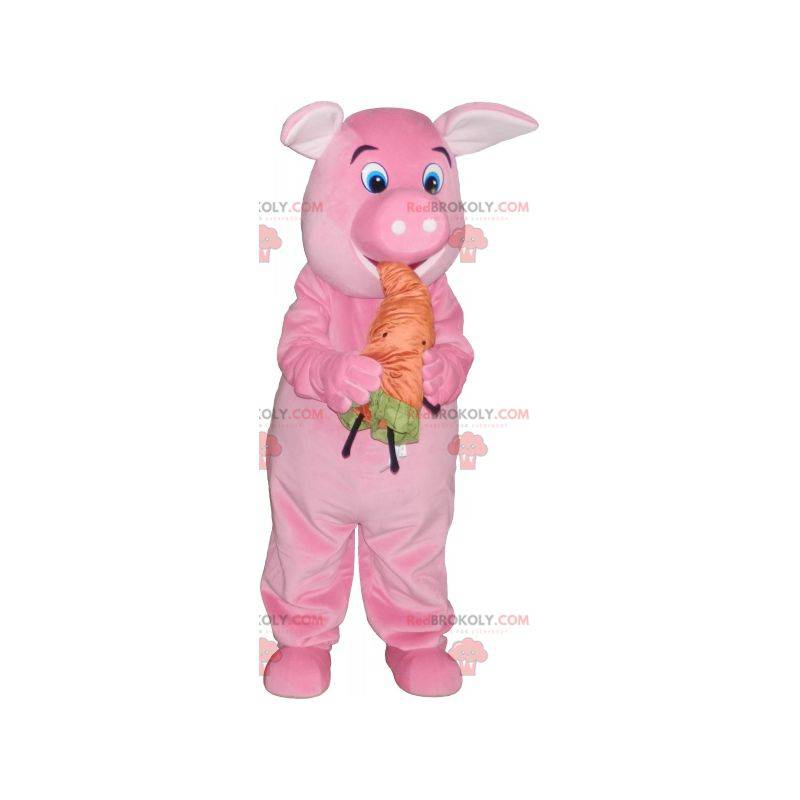 Rosa Schweinemaskottchen mit einer orange Karotte -