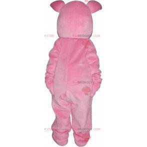 Pink gris maskot med en orange gulerod - Redbrokoly.com