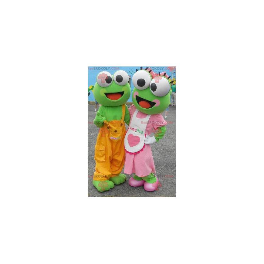 2 mascottes van groene kikkers in kleurrijke outfit -