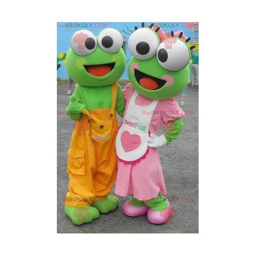 2 mascottes van groene kikkers in kleurrijke outfit -