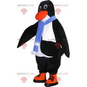 Mascota de pingüino blanco y negro realista con accesorios -