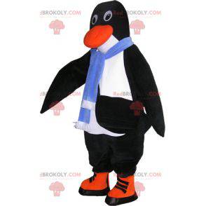 Mascota de pingüino blanco y negro realista con accesorios -