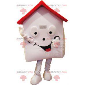 Bardzo uśmiechnięta biało-czerwona maskotka domu -