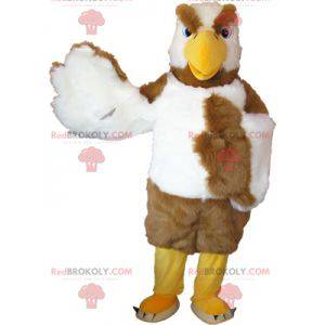 Mascotte d'aigle blanc et marron à l'air méchant -