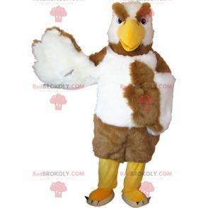 Águia branca e marrom mascote parecendo horrível -