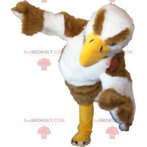Mascot águila blanca y marrón mirando desagradable -
