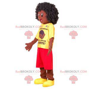 Mascotte ragazzo africano con un vestito giallo e rosso -