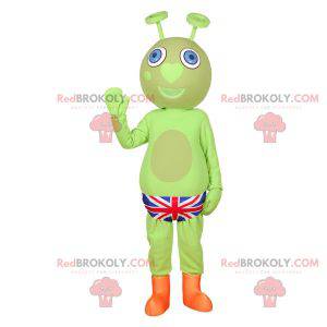 Groene buitenaardse mascotte met een Britse slip -