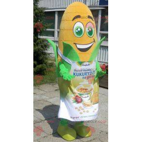 Mascota de mazorca de maíz gigante con ojos verdes y un
