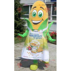 Giant corn ear mascot with green eyes and an apron -