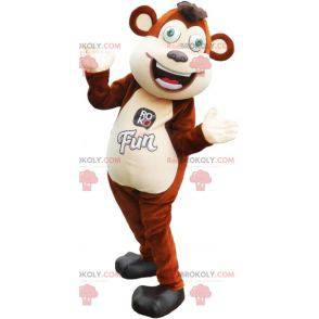 Large brown and white monkey mascot with green eyes -