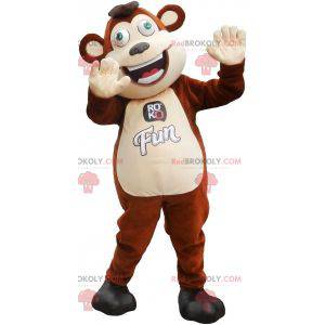 Grote bruine en witte aapmascotte met groene ogen -