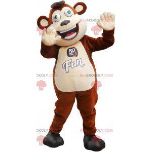 Mascotte de grand singe marron et blanc avec les yeux verts -