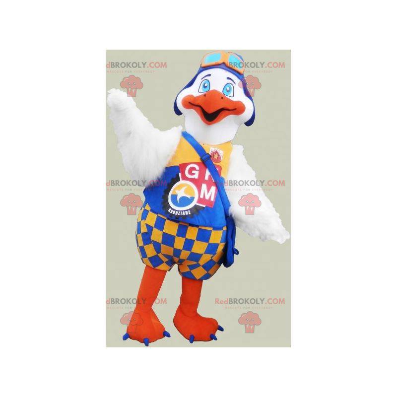 Mascot gran pájaro blanco y naranja con un traje colorido -