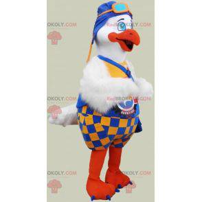 Mascot gran pájaro blanco y naranja con un traje colorido -