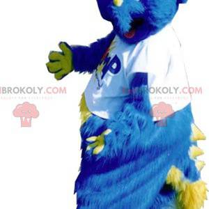 Mascotte de dinosaure bleu et jaune tout poilu - Redbrokoly.com