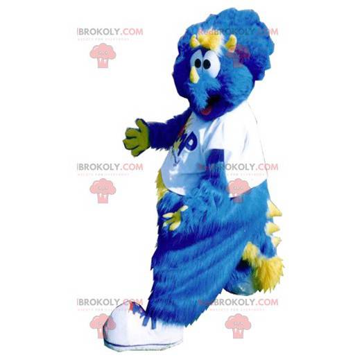 Mascote dinossauro azul e amarelo todo peludo - Redbrokoly.com