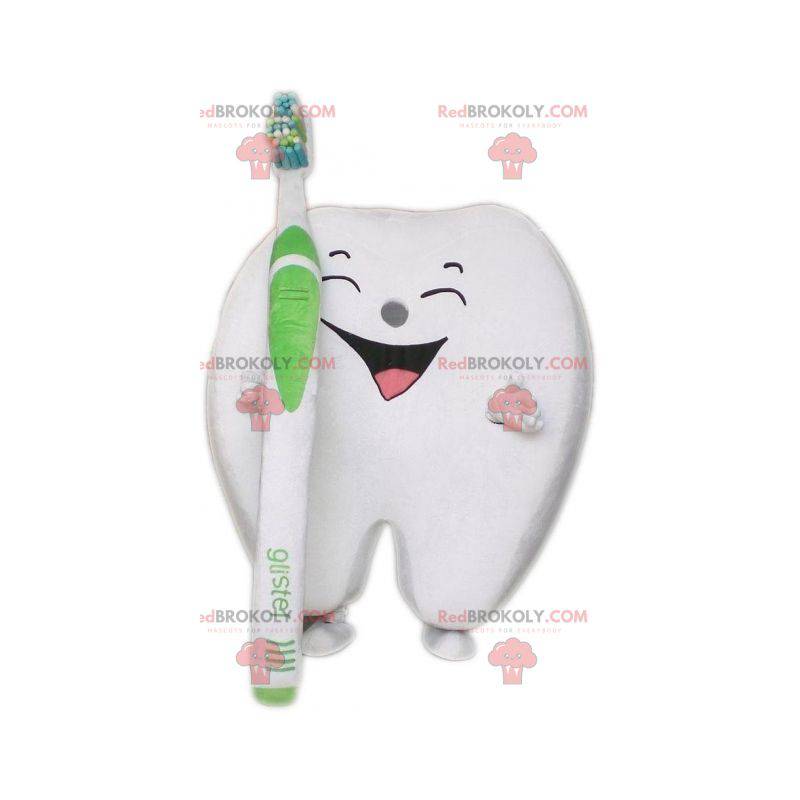 Riesiges weißes Zahnmaskottchen mit einer Zahnbürste -