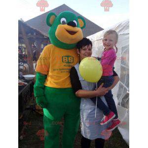 Mascotte gigante dell'orsacchiotto verde e giallo -