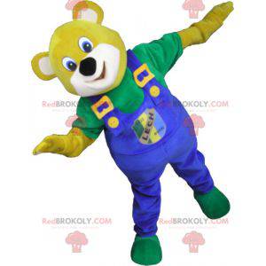 Mascote urso amarelo com macacão azul - Redbrokoly.com