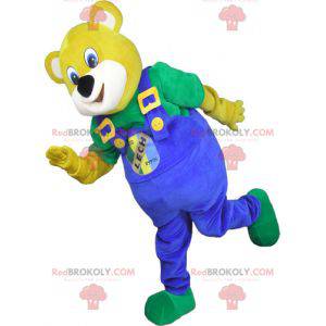 Mascote urso amarelo com macacão azul - Redbrokoly.com