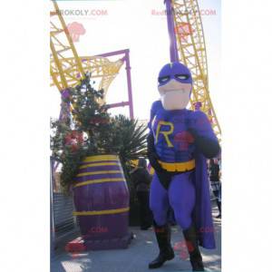 Mascotte del supereroe nella combinazione blu e gialla -