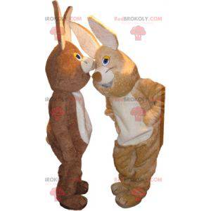2 mascotes coelhos, um marrom e um bege - Redbrokoly.com