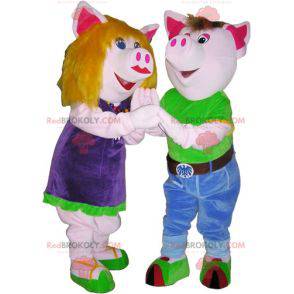 2 mascottes de cochons un garçon et une fille. Costume de