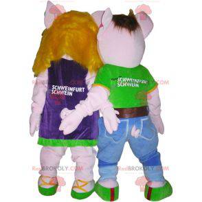 2 Schweinemaskottchen ein Junge und ein Mädchen. Paarkostüm -