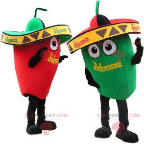 2 mascots a green pepper and a red pepper with hats -