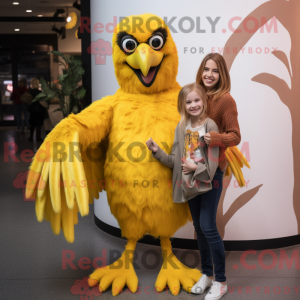 Mascotte de harpie jaune...