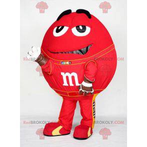 Mascota roja gigante de M&M. Mascota de caramelo de chocolate -