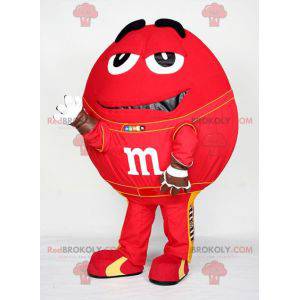 Mascotte de M&M's rouge géant. Mascotte de bonbon chocolaté -