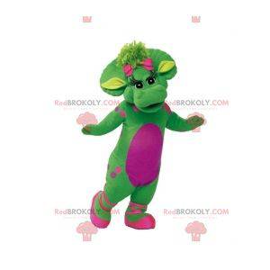 Kæmpe og elegant grøn og lyserød dinosaur maskot -