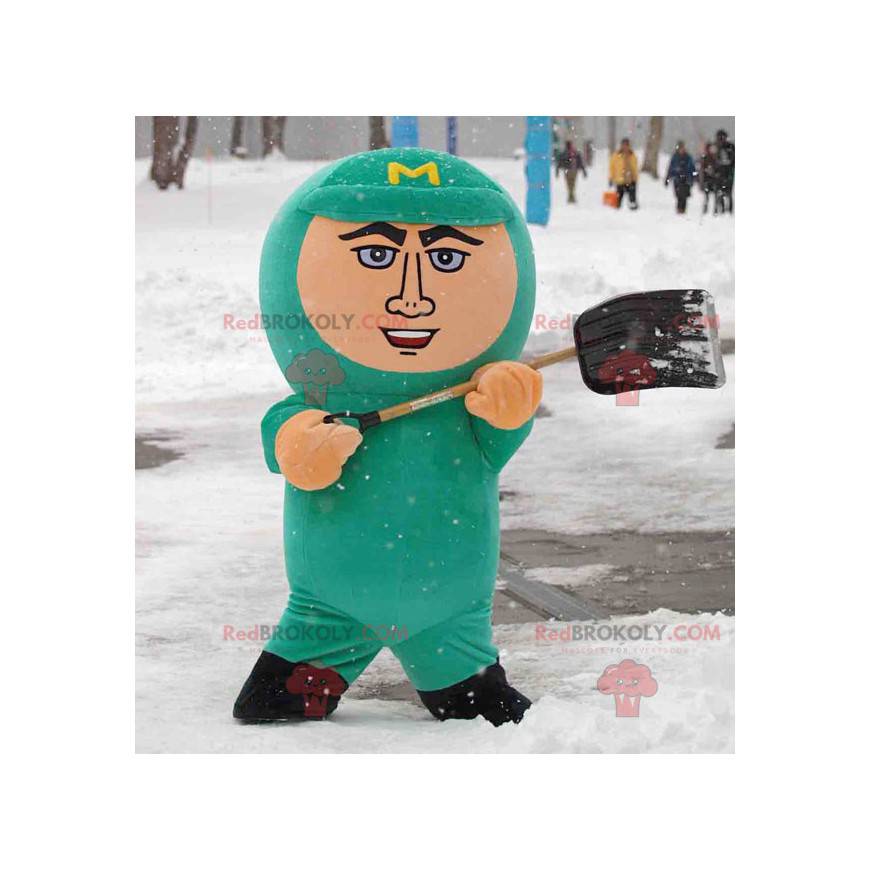 Hombre mascota con un traje y un pasamontañas verde -