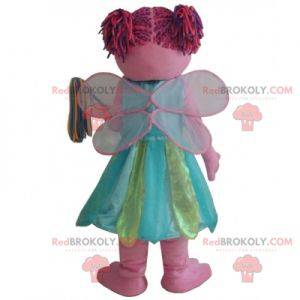 Sorridente mascotte fata rosa con un vestito colorato -
