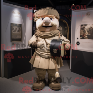 Mascotte de cornemuse beige...