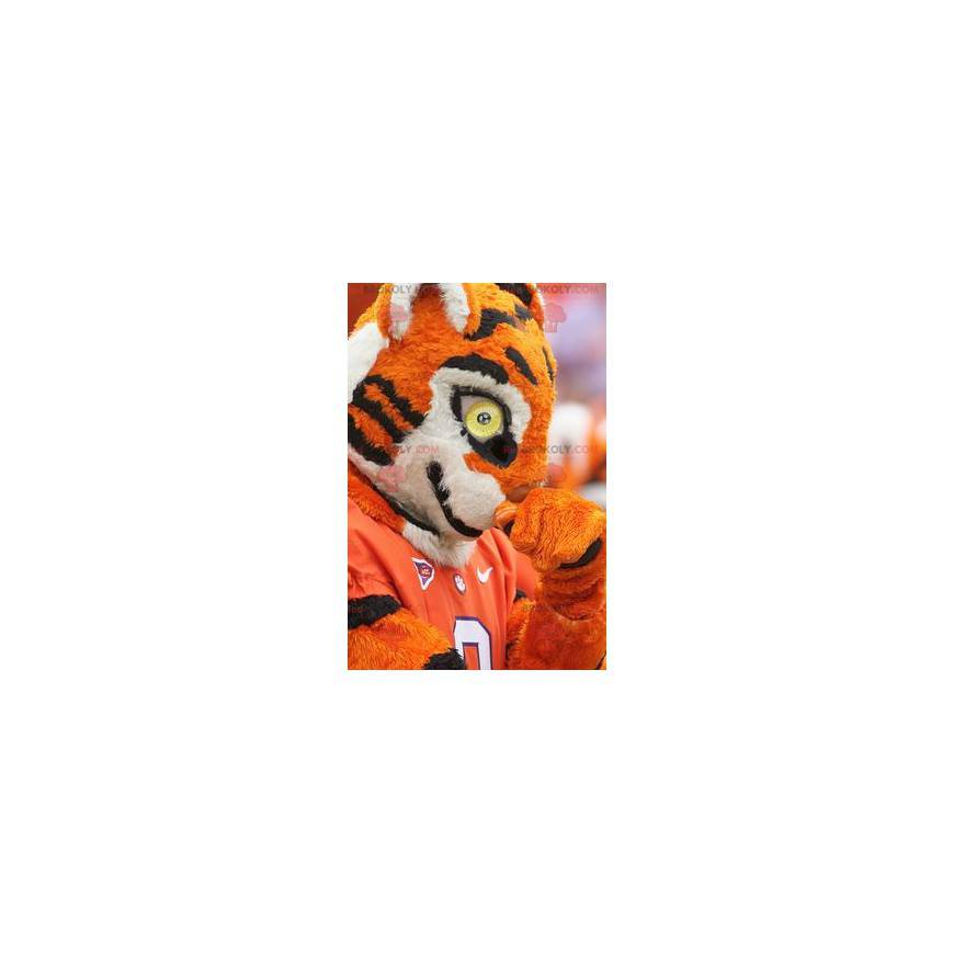 Mascote tigre preto e branco laranja em roupas esportivas -