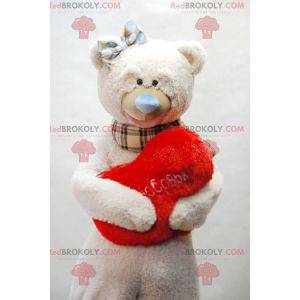 Beige teddy bear mascot with a plaid scarf - Redbrokoly.com
