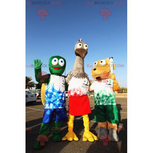 3 mascots a green turtle a gray ostrich and a dog -