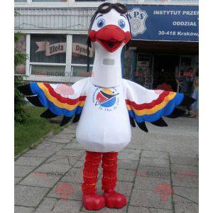 Hvid stork maskot med flerfarvede vinger - Redbrokoly.com