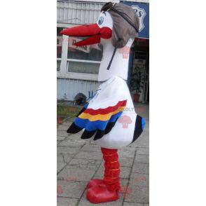 Mascotte di cicogna bianca con ali multicolori - Redbrokoly.com