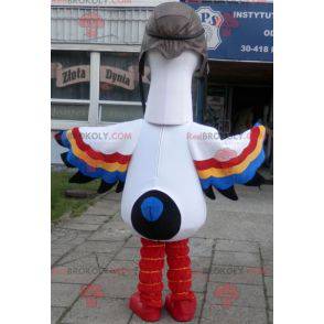 Mascotte de cigogne blanche avec des ailes multicolores -