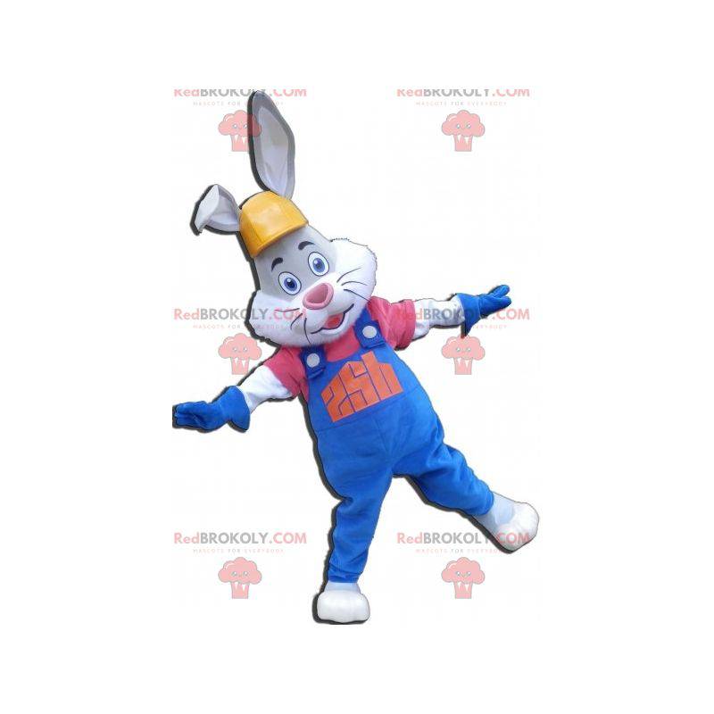 Mascotte de lapin gris et blanc avec une salopette et un casque