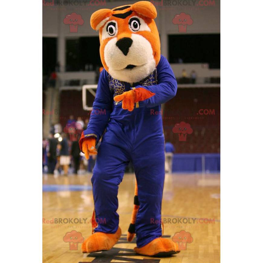 Orange and white tiger mascot in blue outfit - Redbrokoly.com