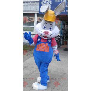 Mascotte coniglio grigio e bianco con tuta e cuffie -