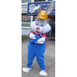 Gray and white rabbit mascot with overalls and headphones -