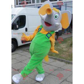 Mascote elefante cinza e amarelo vestido de macacão -