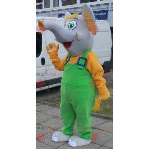 Mascote elefante cinza e amarelo vestido de macacão -