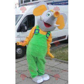 Mascote elefante cinza e amarelo vestido de macacão -